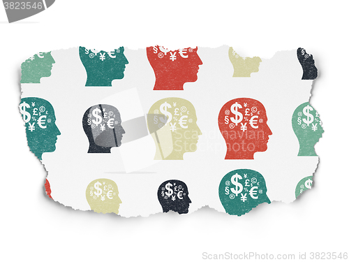 Image of Learning concept: Head With Finance Symbol icons on Torn Paper background
