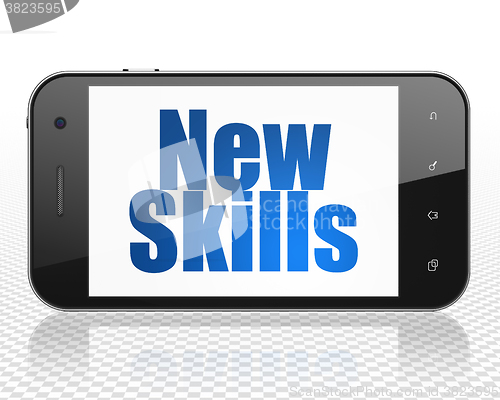 Image of Studying concept: Smartphone with New Skills on display