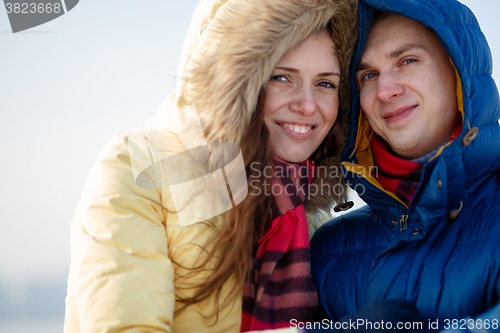 Image of Young couple together at outdoor in winter