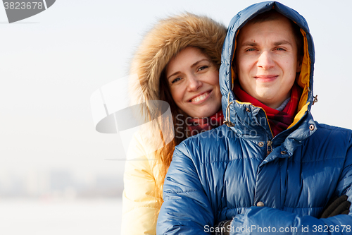 Image of Young couple together at outdoor in winter