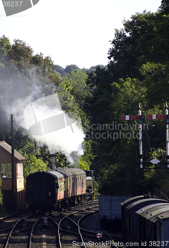 Image of Steam train pulling carriages