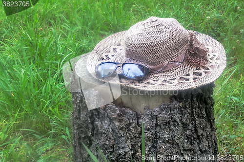 Image of Summer hat for women and sunglasses.