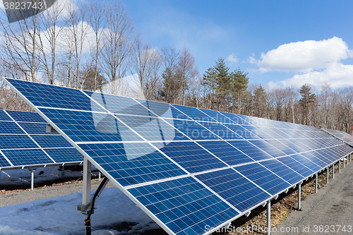 Image of Solar panel and blue sky