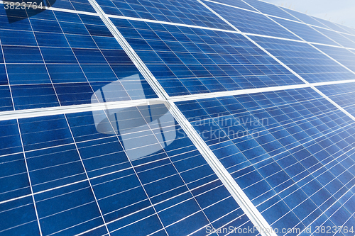 Image of Solar panel and blue sky