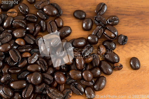 Image of Coffee on grunge wooden background