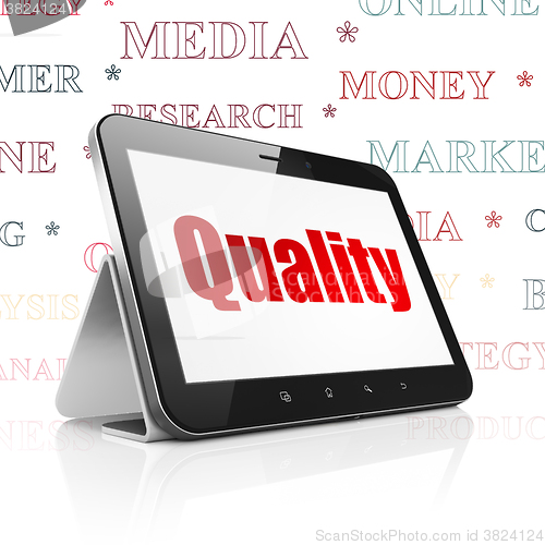 Image of Advertising concept: Tablet Computer with Quality on display