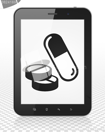 Image of Medicine concept: Tablet Pc Computer with Pills on display