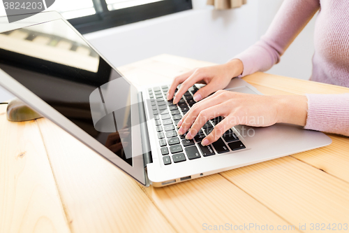 Image of Woman use of the laptop computer