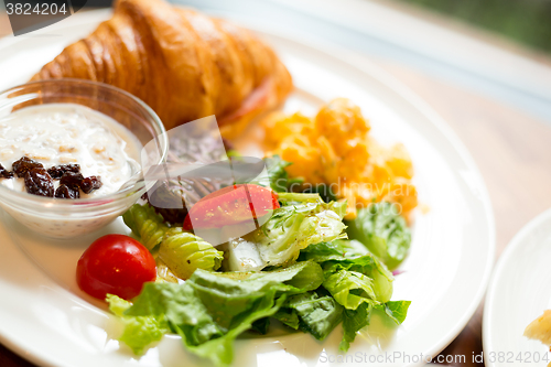 Image of Fresh croissants with salad