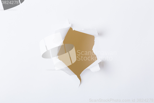 Image of Round hole in paper 
