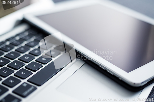 Image of Notebook computer and digital tablet