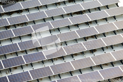 Image of Blue solar panels on roof top