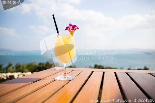 Image of Orange juice at seaside restaurant