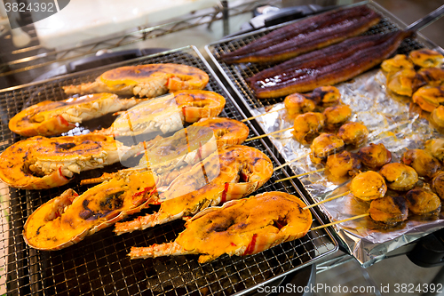Image of Roasted lobster and scallop at wet market