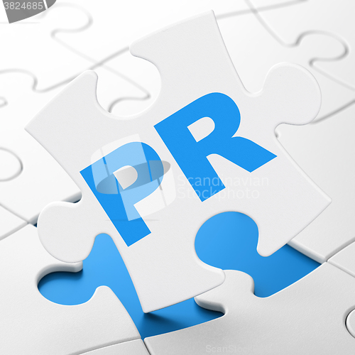 Image of Advertising concept: PR on puzzle background