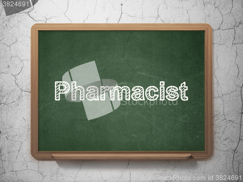 Image of Healthcare concept: Pharmacist on chalkboard background