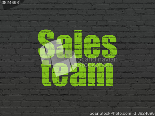Image of Marketing concept: Sales Team on wall background