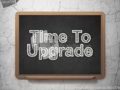 Image of Time concept: Time To Upgrade on chalkboard background