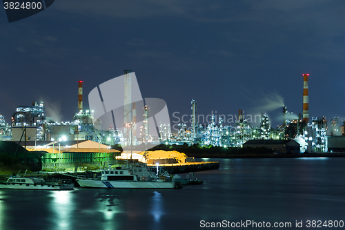 Image of Seaside Industrial Factory working at night