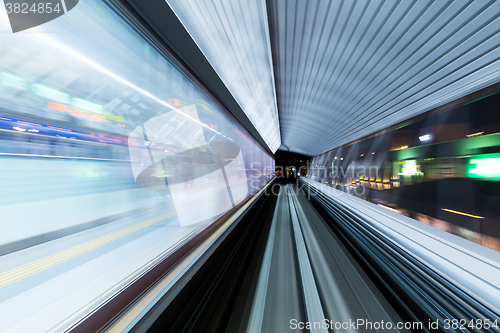 Image of Fast light trails in train