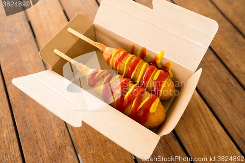 Image of Corn dog in paper box