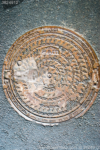 Image of Old manhole. Kaliningrad. Russia