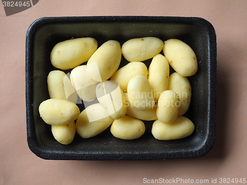 Image of Potato vegetables in a tub