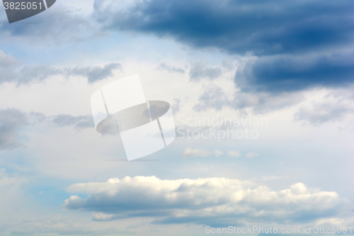 Image of blue sky background with tiny clouds