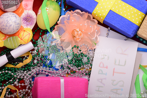 Image of Easter background with eggs, ribbons and spring decoration