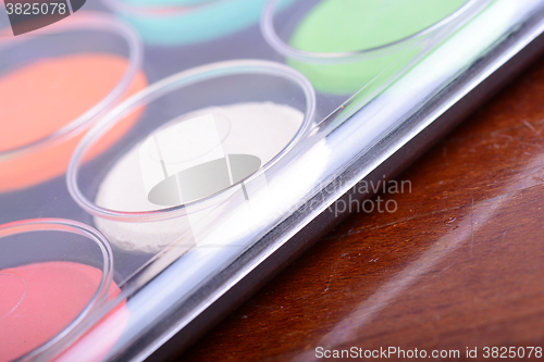 Image of set of watercolor paints close up