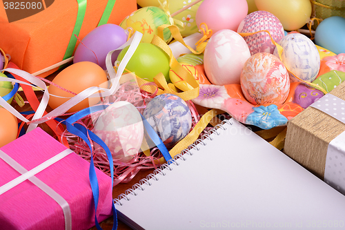 Image of Easter background with eggs, ribbons and spring decoration