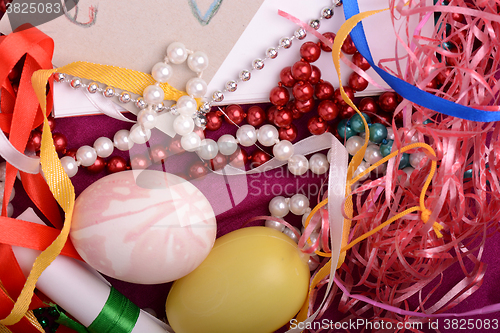 Image of Easter background with eggs, ribbons and spring decoration