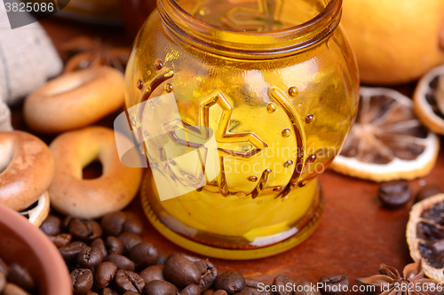 Image of coffee beans and candle. lemon on old vintage background