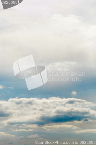 Image of blue sky background with tiny clouds