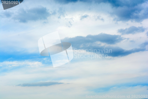 Image of Fantastic soft white clouds against blue sky
