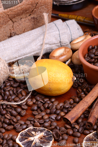 Image of Vintage still life with coffee beans on wooden background