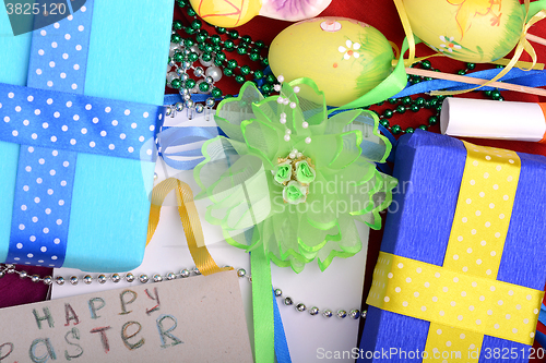 Image of Easter background with eggs, ribbons and spring decoration