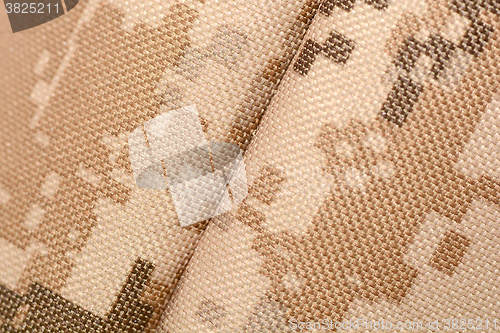 Image of Close up of military uniform fabric.