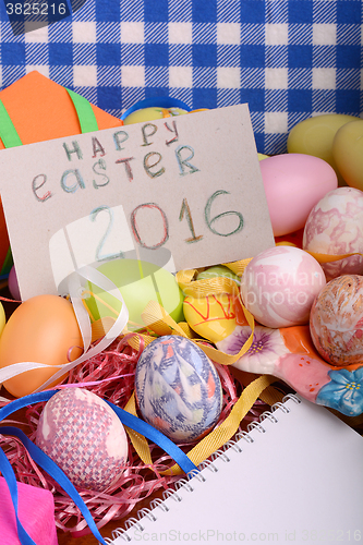 Image of Easter background with eggs, ribbons and spring decoration