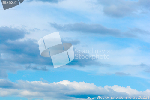 Image of Fantastic soft white clouds against blue sky