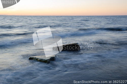 Image of Rocks in milky water