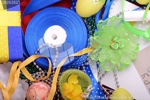 Image of Easter background with eggs, ribbons and spring decoration