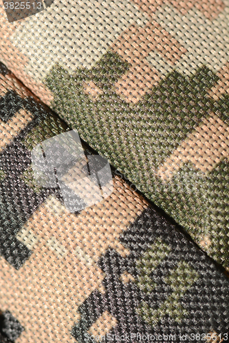 Image of Close up of military uniform fabric.