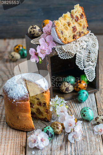 Image of Easter cake and colorful eggs.