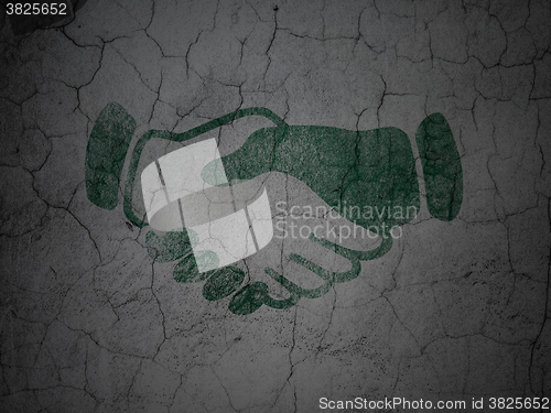 Image of Business concept: Handshake on grunge wall background