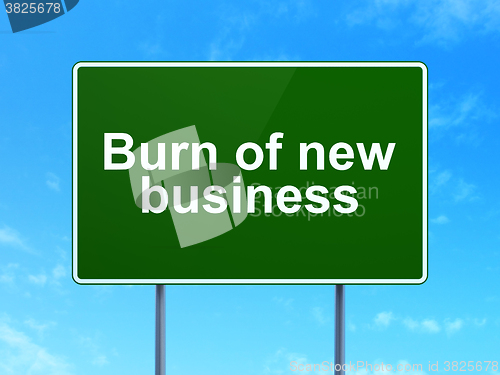 Image of Business concept: Burn Of new Business on road sign background