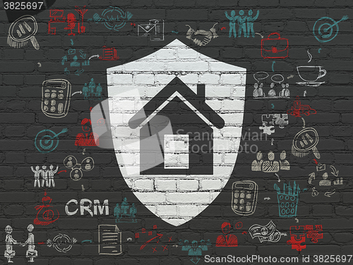 Image of Business concept: Shield on wall background