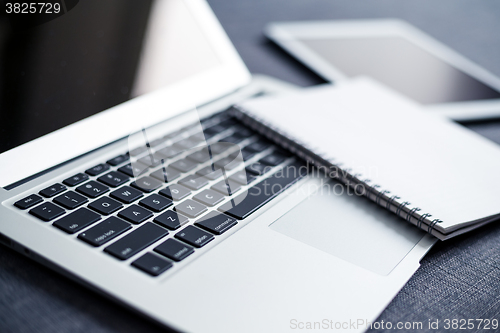 Image of Laptop, tablet and note