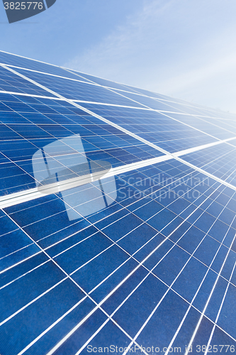 Image of Solar panel under blue sky