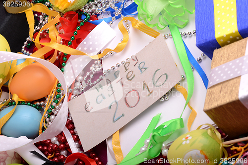 Image of Easter background with eggs, ribbons and spring decoration